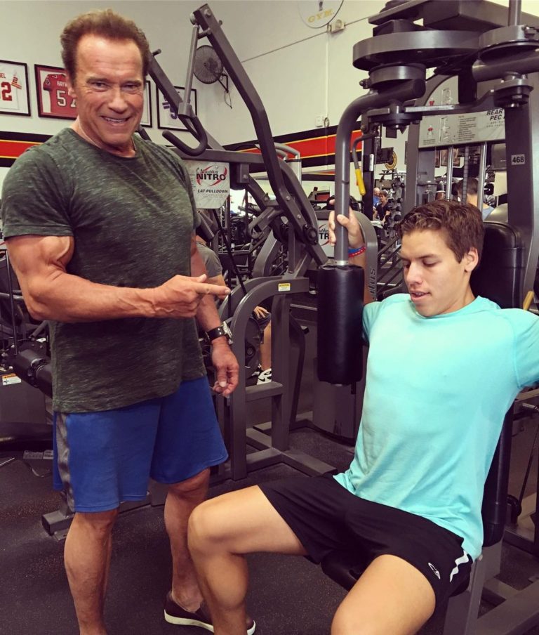 Joseph Baena in the gym with father Arnold